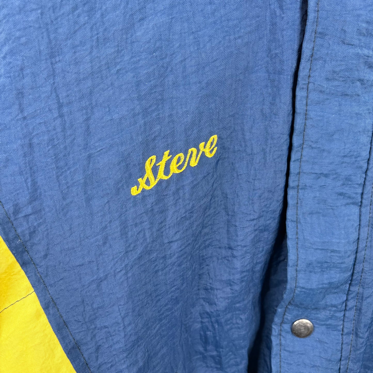 Vintage 90's "Steve" Starter WVU Puffer Jacket (M)