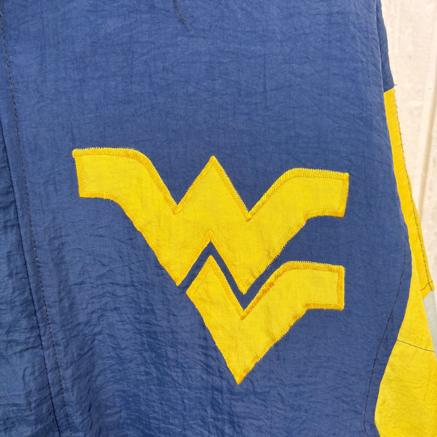 Vintage 90's "Steve" Starter WVU Puffer Jacket (M)