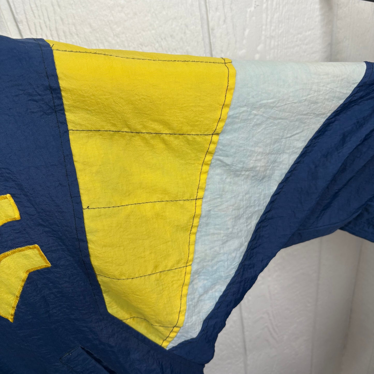 Vintage 90's "Steve" Starter WVU Puffer Jacket (M)